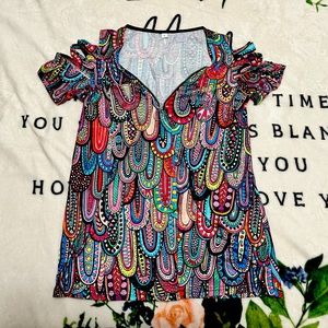 Cute, fun, and retro. Fits like a large.